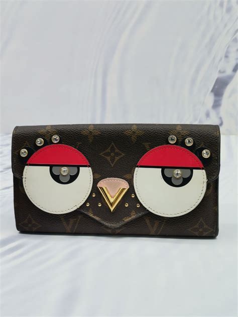 louis vuitton owl wallet replica|counterfeit louis vuitton wallet.